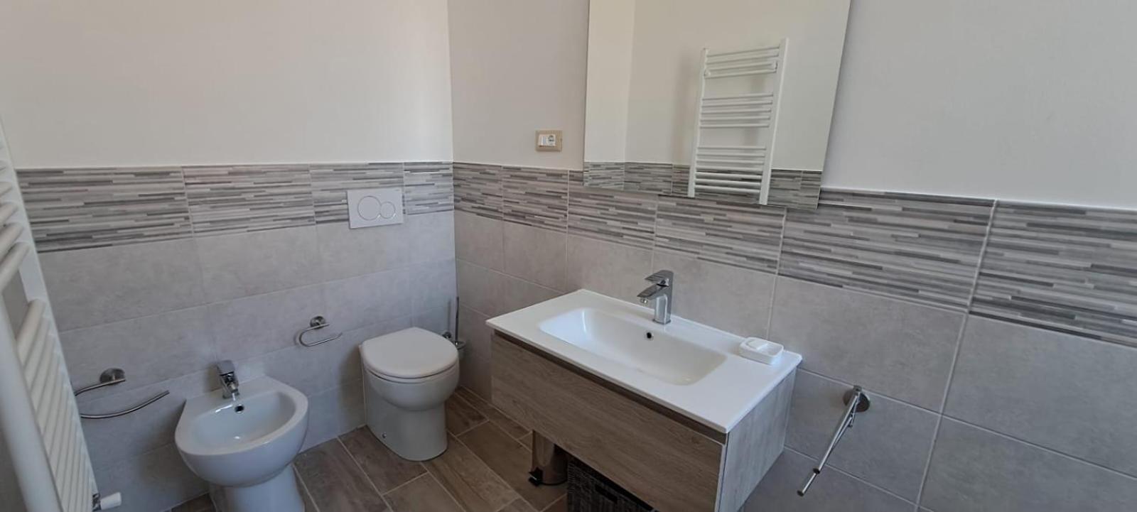 Hotel Il Porto Janov Pokoj fotografie